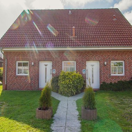 Appartement Haus Leuchtturm - Ebbe à Krummhörn Extérieur photo