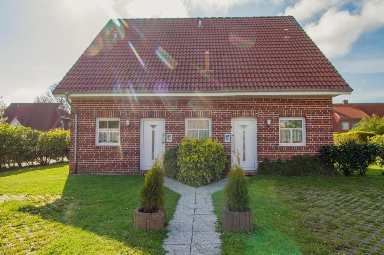 Appartement Haus Leuchtturm - Ebbe à Krummhörn Extérieur photo