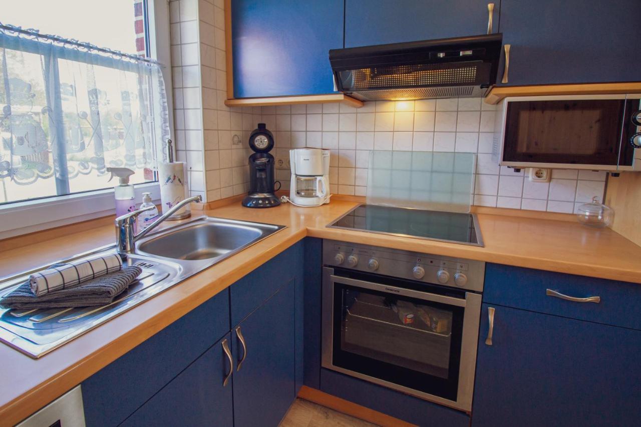 Appartement Haus Leuchtturm - Ebbe à Krummhörn Extérieur photo